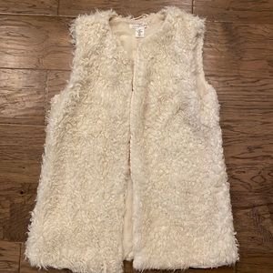Cream fuzzy vest! Super cute layered w/jeans or leggings!